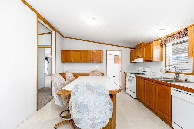 kitchen with white appliances, light floors, lofted ceiling, a sink, and light countertops