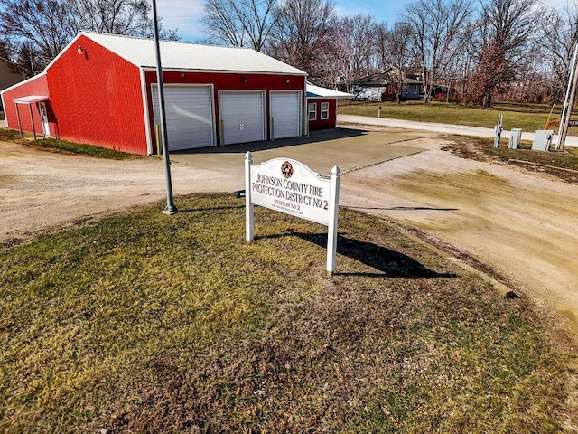 exterior space with dirt driveway