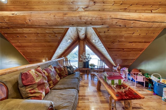 unfurnished living room with lofted ceiling, wood ceiling, and light wood finished floors