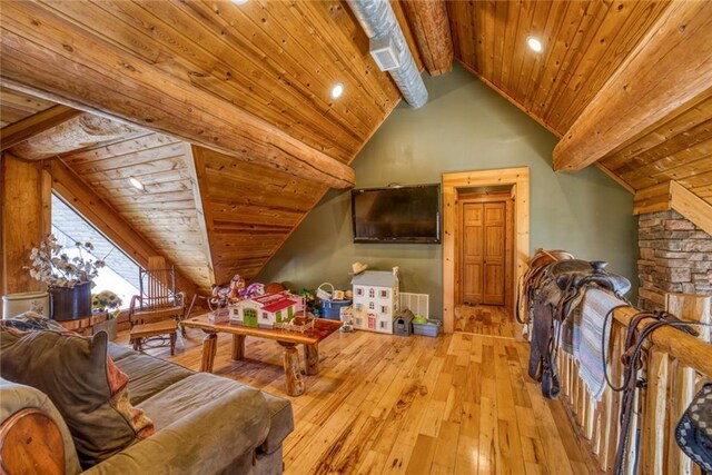 interior space with wood ceiling, vaulted ceiling with beams, and light wood-type flooring