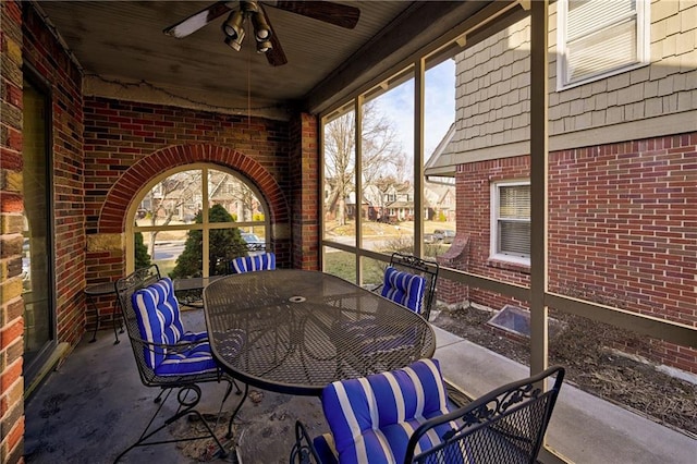 view of patio / terrace with ceiling fan and outdoor dining space