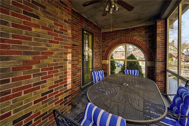 view of patio / terrace with ceiling fan and outdoor dining space