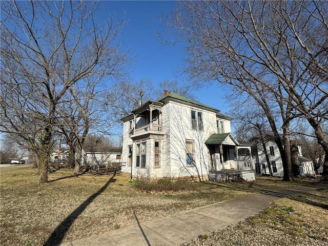 view of home's exterior featuring a chimney