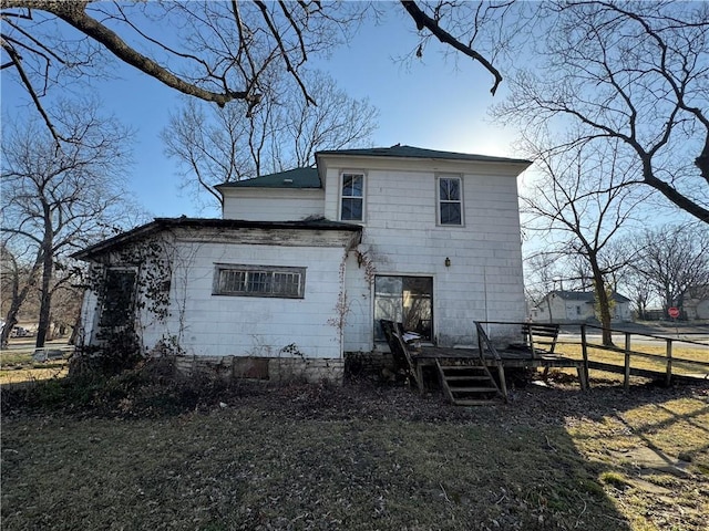 rear view of house with a deck