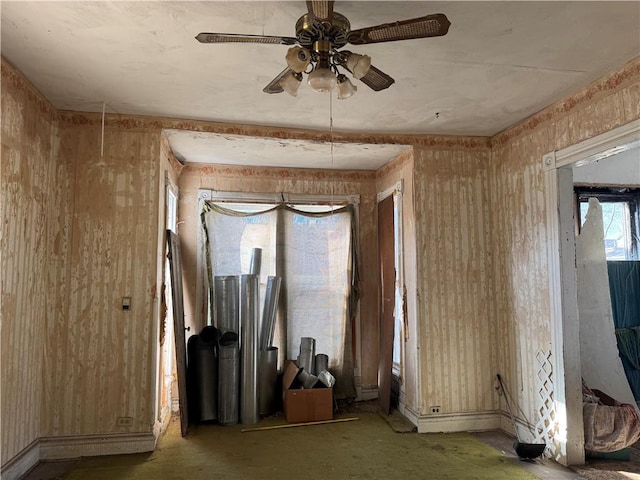 empty room featuring ceiling fan