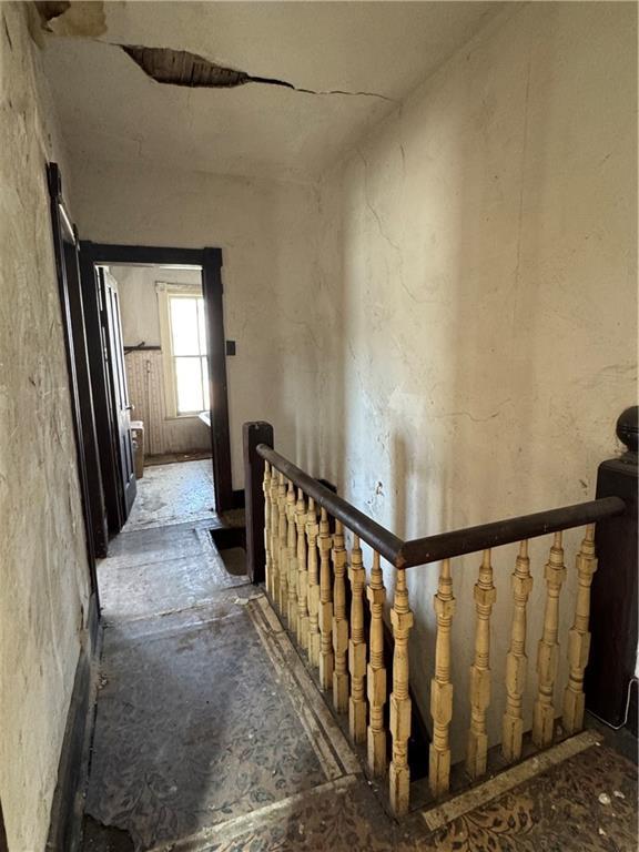 hallway with an upstairs landing