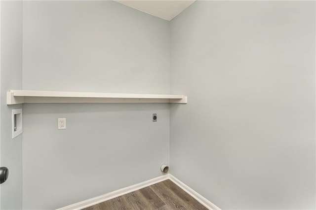 laundry room with electric dryer hookup, dark wood-style floors, baseboards, hookup for a washing machine, and laundry area