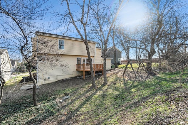 rear view of property with a deck