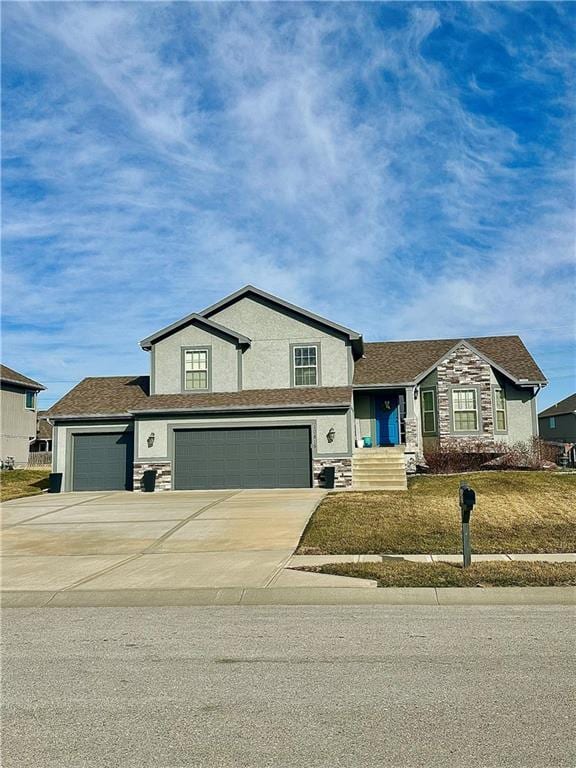 view of front of home with stone siding, stucco siding, driveway, and a garage