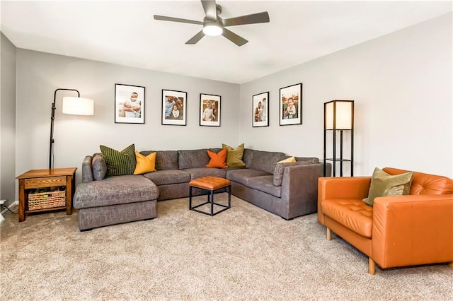 living room featuring carpet and ceiling fan