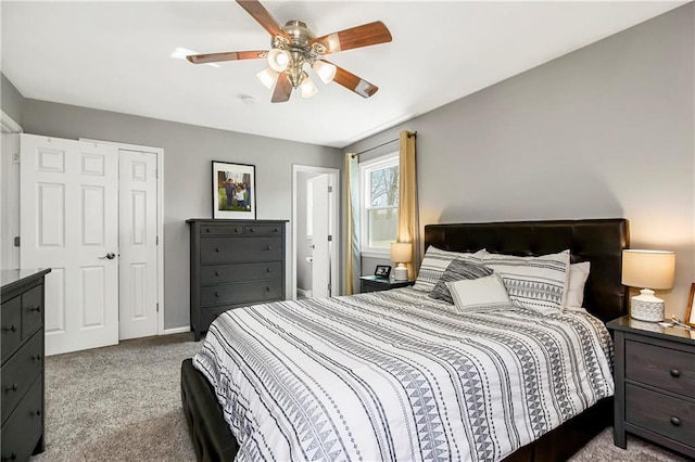 bedroom with baseboards, a ceiling fan, and carpet flooring