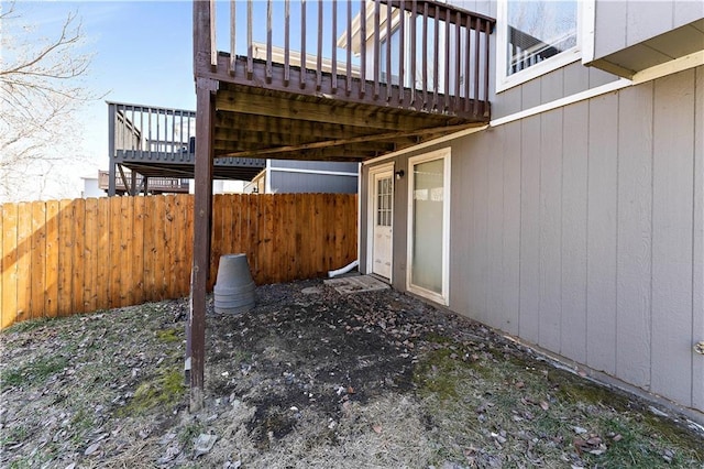 view of patio featuring fence