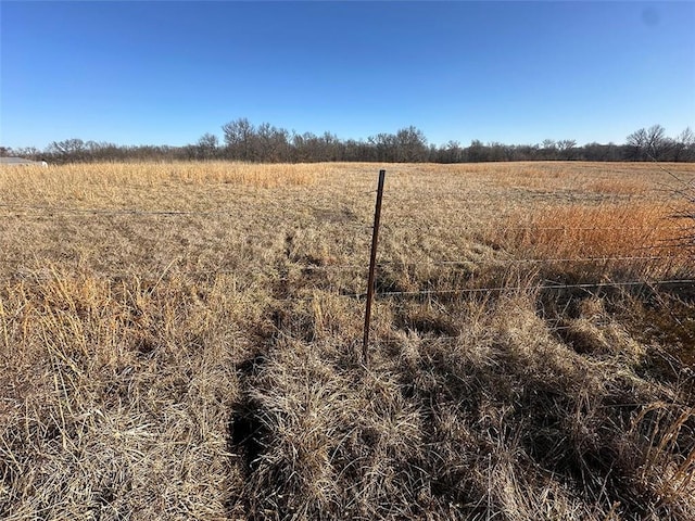 view of landscape with a rural view