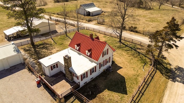 birds eye view of property featuring a rural view