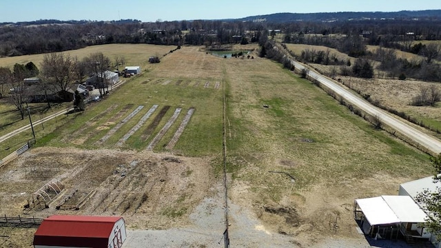 birds eye view of property featuring a rural view