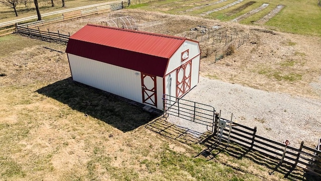 birds eye view of property featuring a rural view