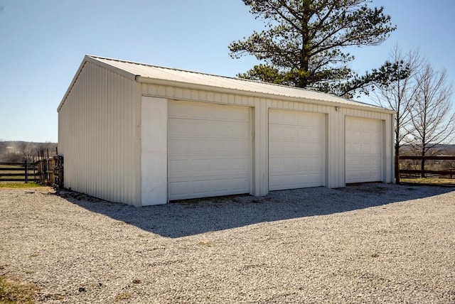 detached garage with fence