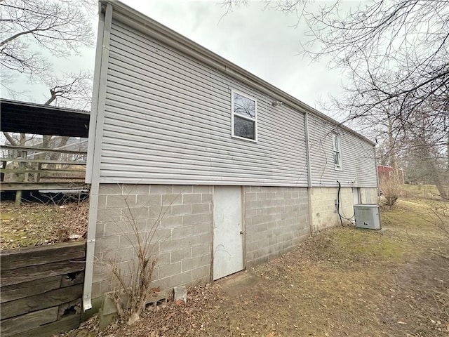 view of home's exterior with central AC