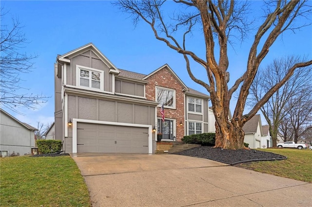 traditional-style home featuring concrete driveway, an attached garage, a front lawn, and stucco siding