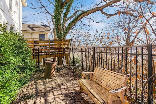 view of patio featuring fence