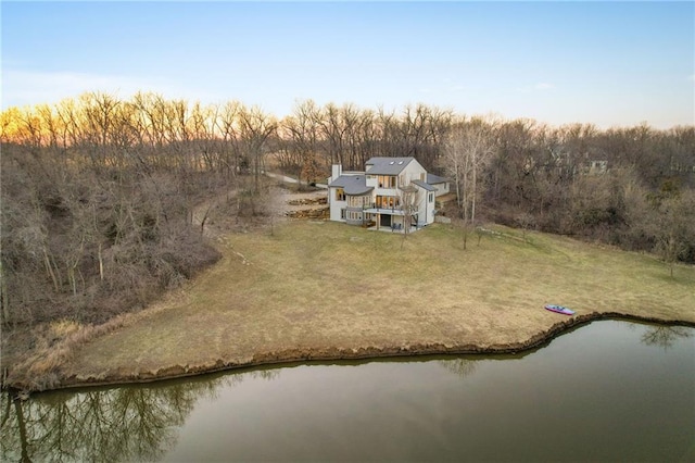 birds eye view of property featuring a water view