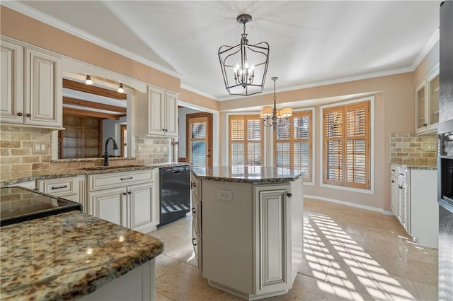 kitchen with a notable chandelier, a sink, a kitchen island, tasteful backsplash, and dishwasher