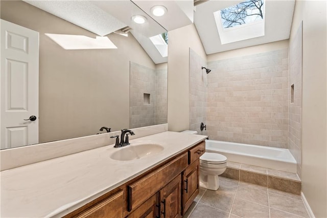 full bath featuring tile patterned flooring, lofted ceiling with skylight, toilet, shower / bathtub combination, and vanity