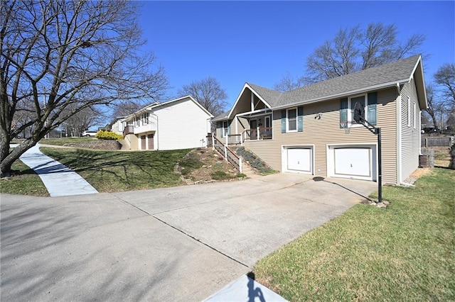 view of front facade with driveway, an attached garage, a shingled roof, stairs, and a front lawn