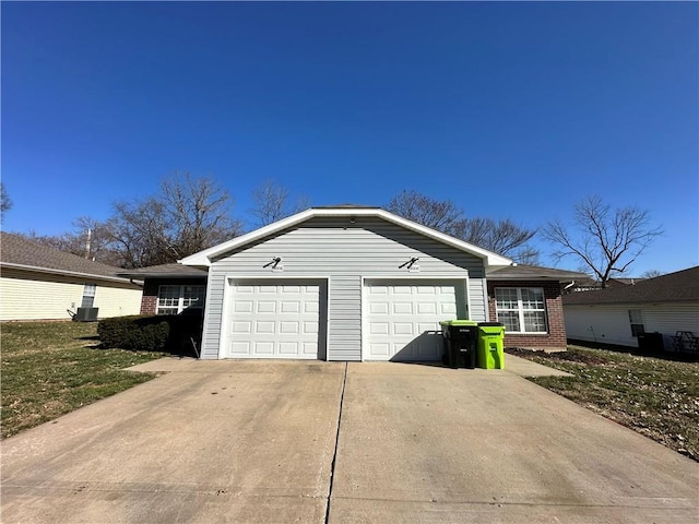 view of home's exterior featuring brick siding, concrete driveway, and a garage