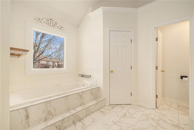 bathroom with baseboards, ornamental molding, vaulted ceiling, a bath, and marble finish floor