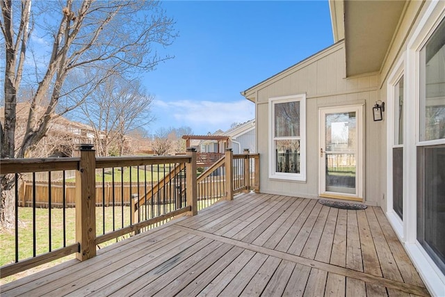 wooden deck featuring fence