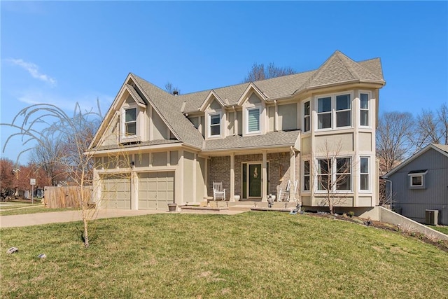 view of front of home with fence, concrete driveway, a front yard, central AC unit, and an attached garage