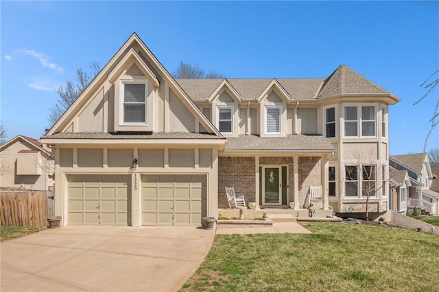 view of front of property featuring stucco siding, concrete driveway, a front yard, and fence