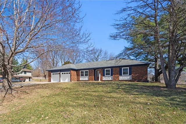 single story home with brick siding, an attached garage, driveway, and a front lawn