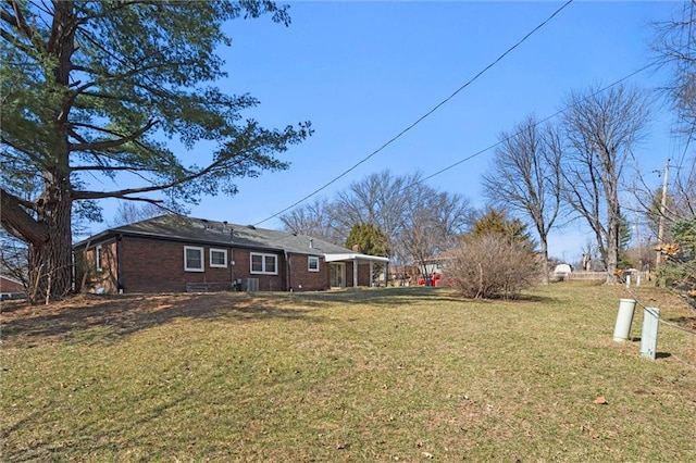 view of yard featuring central AC