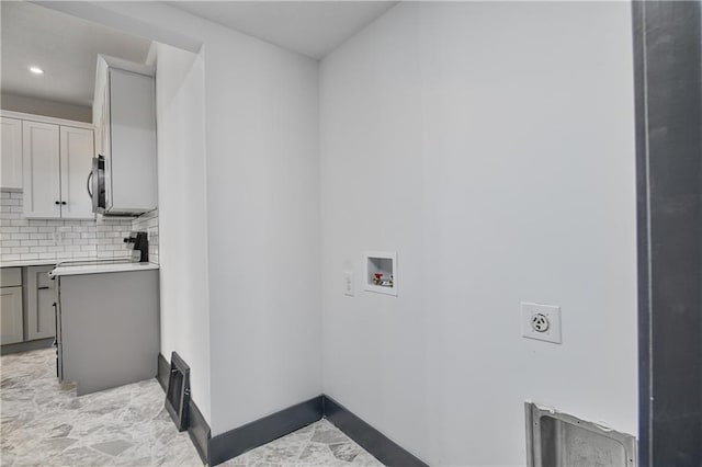 laundry room featuring baseboards, laundry area, recessed lighting, hookup for a washing machine, and electric dryer hookup