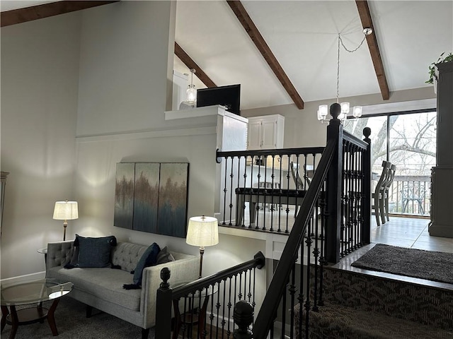 stairs with a notable chandelier, high vaulted ceiling, and beamed ceiling