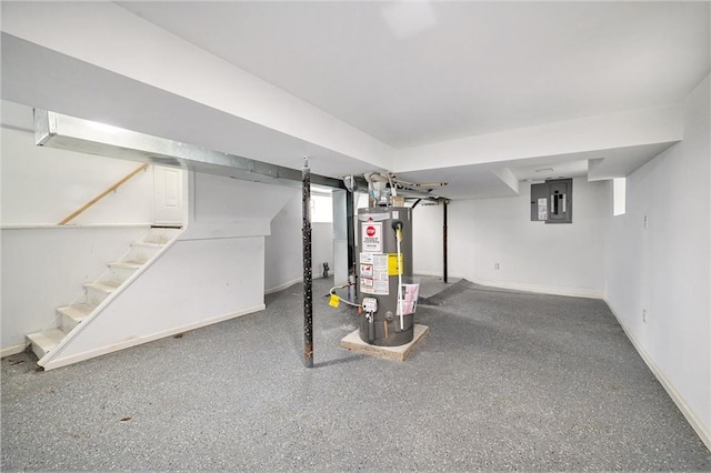 basement with water heater, baseboards, stairs, and electric panel