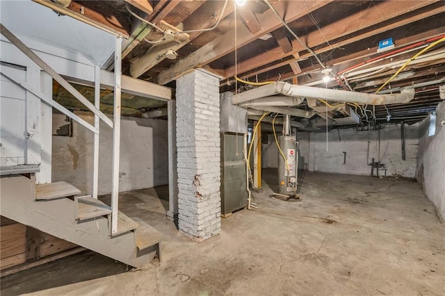 unfinished basement featuring stairs, gas water heater, and heating unit