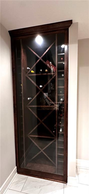 wine room featuring baseboards