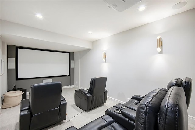 home theater room featuring recessed lighting, light colored carpet, and baseboards