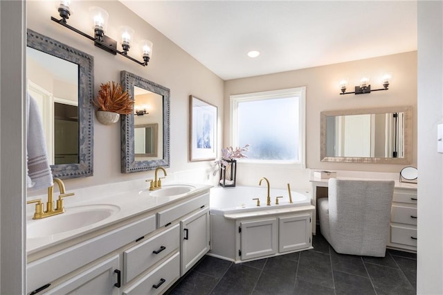 bathroom featuring tile patterned flooring, double vanity, a garden tub, and a sink