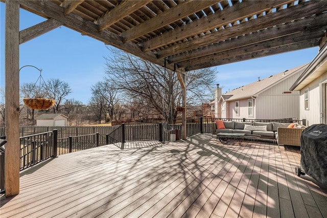 wooden terrace with outdoor lounge area and a pergola