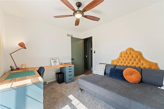 bedroom featuring baseboards, visible vents, a ceiling fan, and carpet