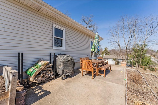 view of patio featuring outdoor dining area