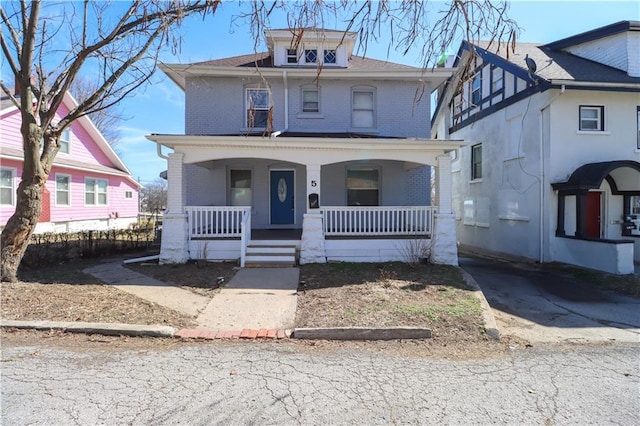 5 Mcgrew Grv, Kansas City, KS 66101 - american foursquare style home with brick siding and covered porch