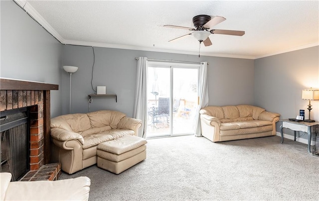 living room featuring crown molding, baseboards, ceiling fan, carpet floors, and a fireplace