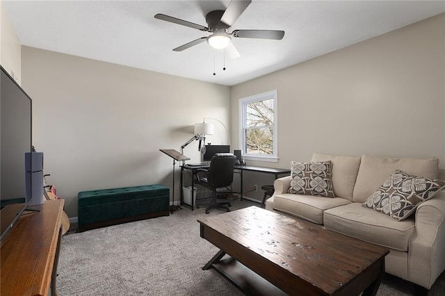 living room with carpet flooring and a ceiling fan