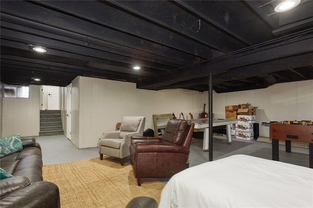 bedroom featuring finished concrete flooring