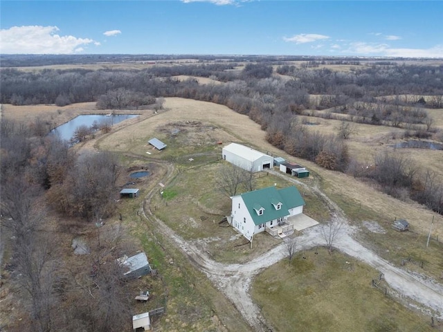 aerial view with a water view and a rural view